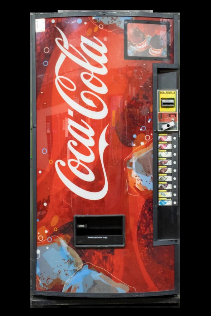 Red Coca-Cola vending machine with product selection buttons and coin/card payment slot